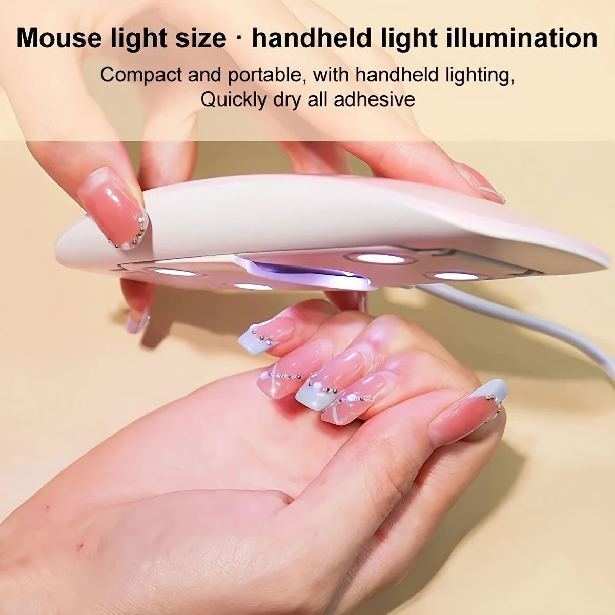 Compact USB-powered nail dryer lamp with foldable design and 6 UV/LED beads for fast gel polish drying on hands and feet.