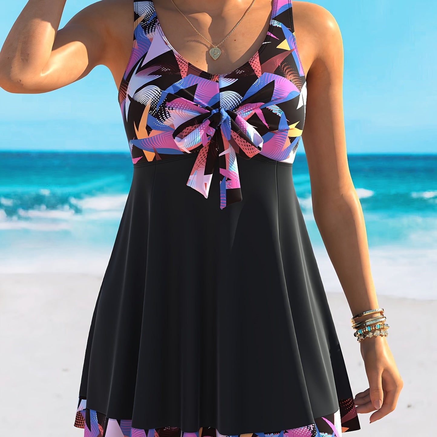 Get ready for the beach with this cute and stylish two-piece tankini set, perfect for a comfortable and stretchy fit. Ideal for your beach vacation.