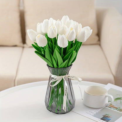 10 elegant white tulip artificial flowers with green leaves are perfect for weddings, engagements, and home decor. Made of durable polyurethane, no batteries needed.