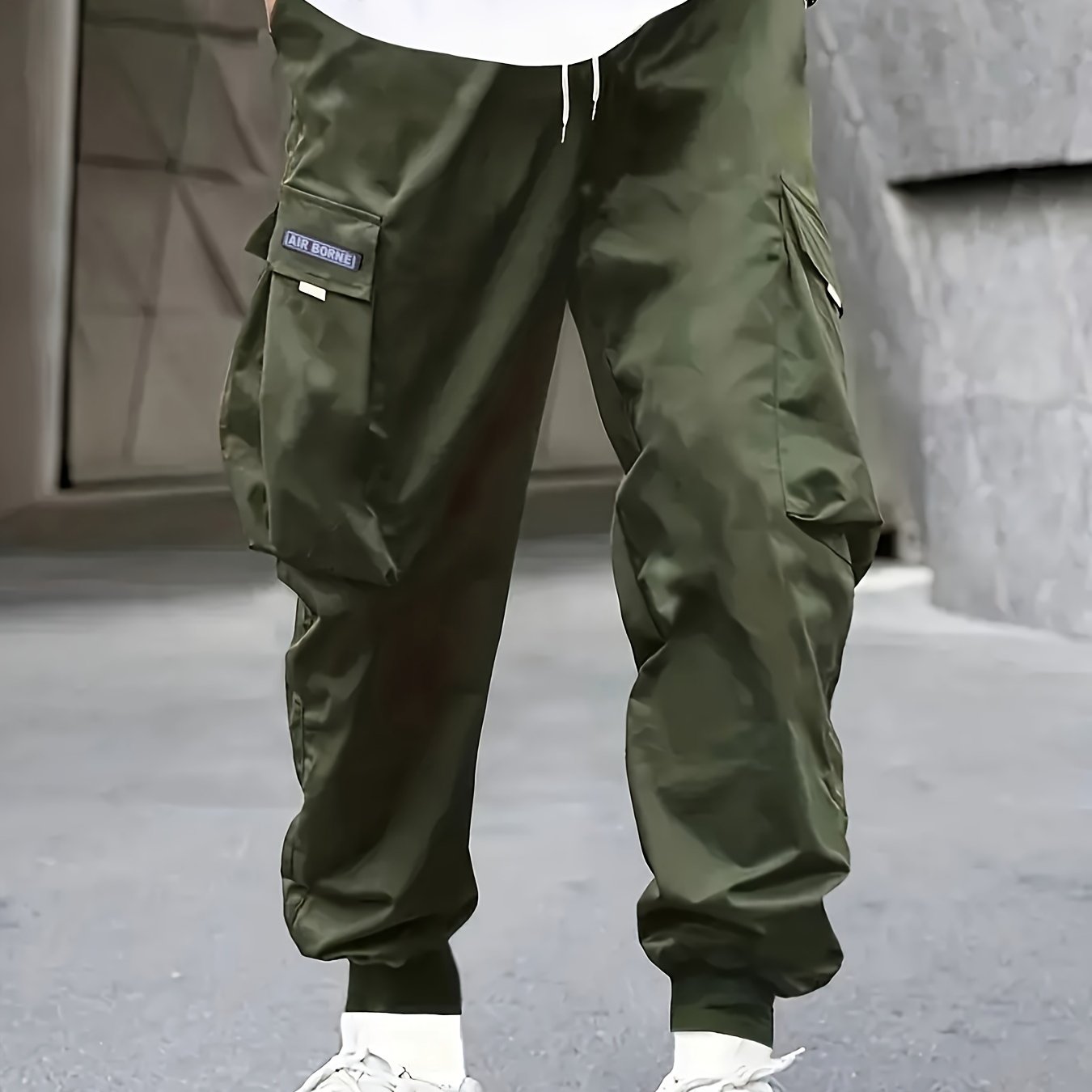 Japanese men's casual work pants with multiple pockets and loose, tied feet for spring 2023