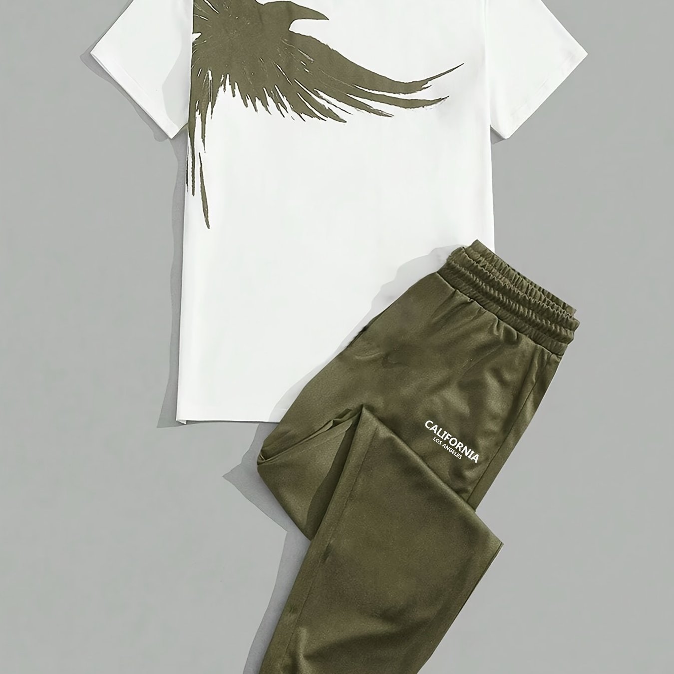 Men's summer outfit with eagle print tee and long pants, great for sports and leisure