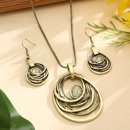 This set includes a pair of earrings and two necklaces made of zinc alloy in an ancient silvery color. The necklaces feature a multi-layer circular mosaic design with a retro bohemian style and a hollow center. This leisure jewelry set is perfect as a