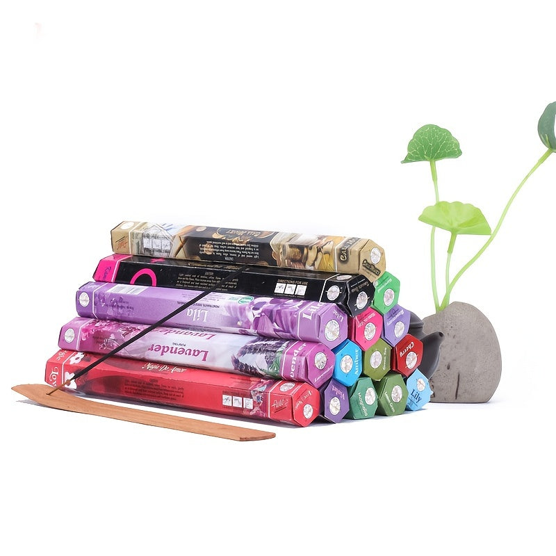 Box of 20 incense sticks in assorted fragrances like Vanilla, Sandalwood, Cherry, Women's, White Rose Yoga, and Lavender. Ideal for yoga, meditation, and home decor. Experience the scents of India.