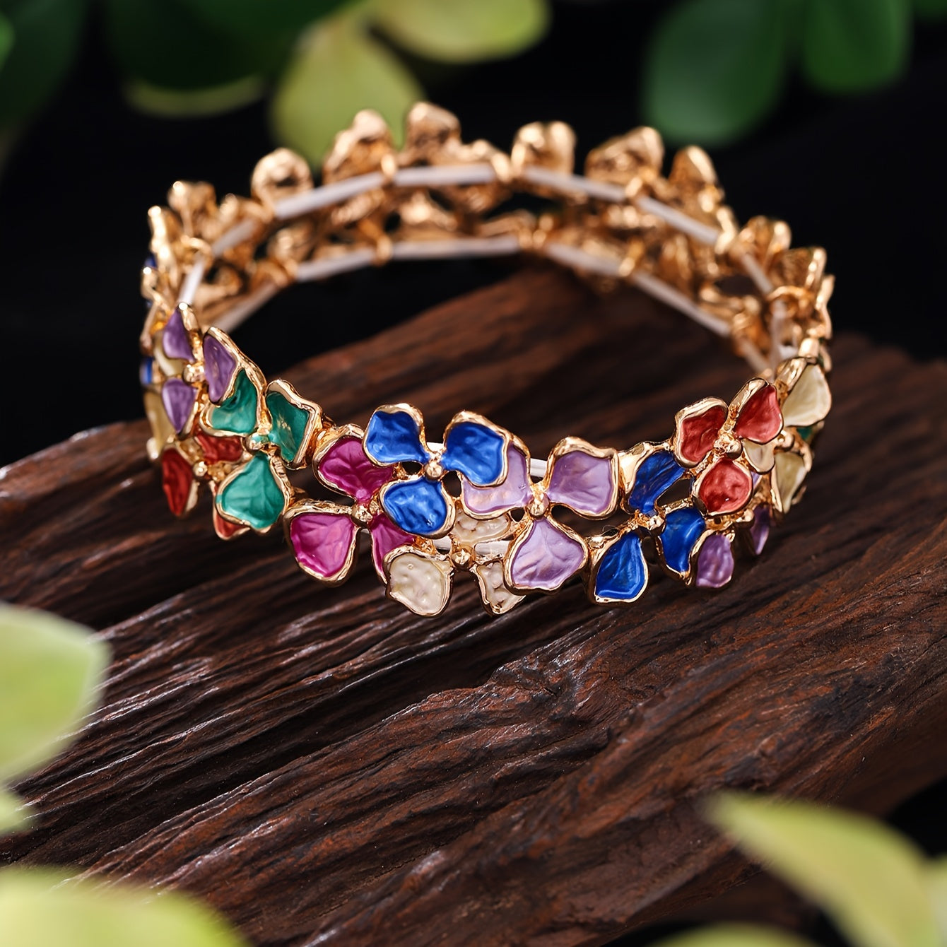 Elegant and timeless, this colorful enamel flower bracelet is made of high-quality zinc alloy. It is designed for women and features a fashionable stretch bangle style that is 18K golden plated. Perfect for daily wear, parties, and holidays, this