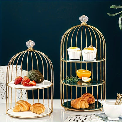 Golden cast iron birdcage cake stand for elegant dessert display in living room, perfect for snacks, fruit, and sweets.