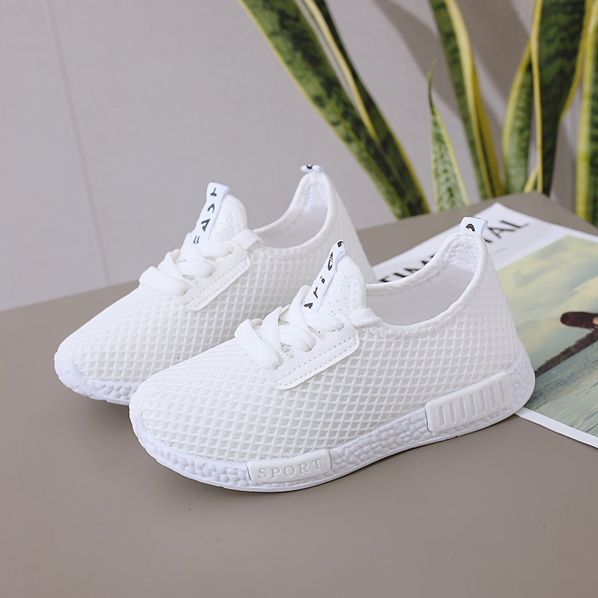 Breathable mesh sneakers for boys and girls, lightweight with lace closure and comfortable PVC sole.