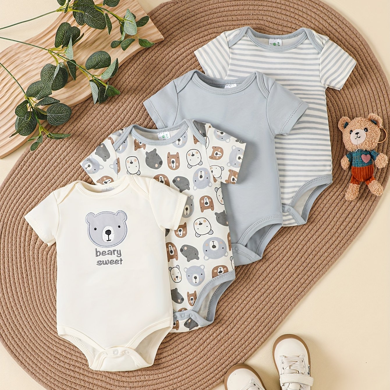 New four-piece set of triangle onesies for men and women, featuring bear cartoon pattern and creative solid color polka dot design. Made of pure cotton for comfort and softness, perfect for