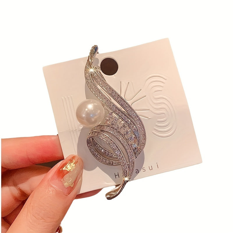 Luxurious Fashion Pin for Suit and Dress Embellishments, featuring an Elegant Alloy Brooch adorned with Sparkling Rhinestones, a Pearl Accent, and an Irregular Swirl Design.