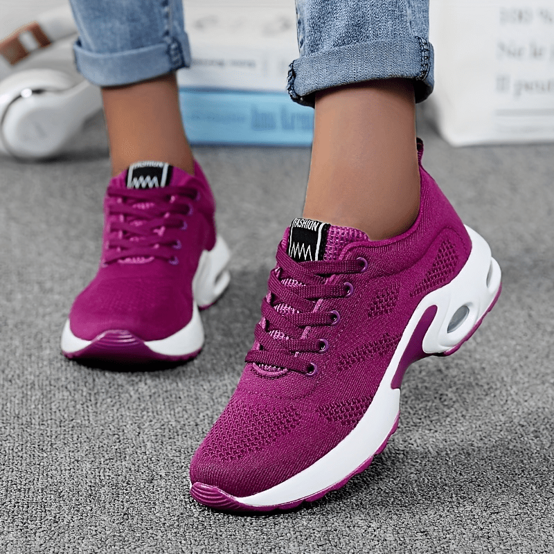 The women's sneakers are shock-absorbing and comfortable for outdoor sports with an air cushion and lace-up design.