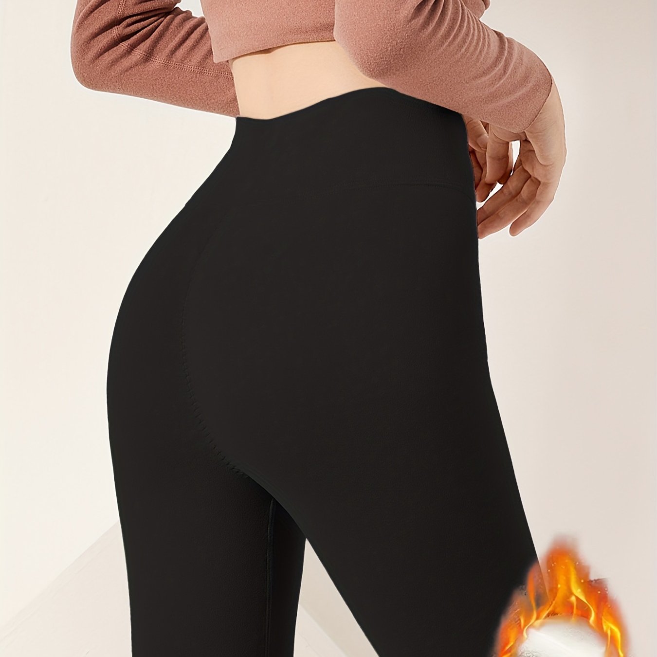 Warm high-waisted leggings with fleece lining, perfect for winter.