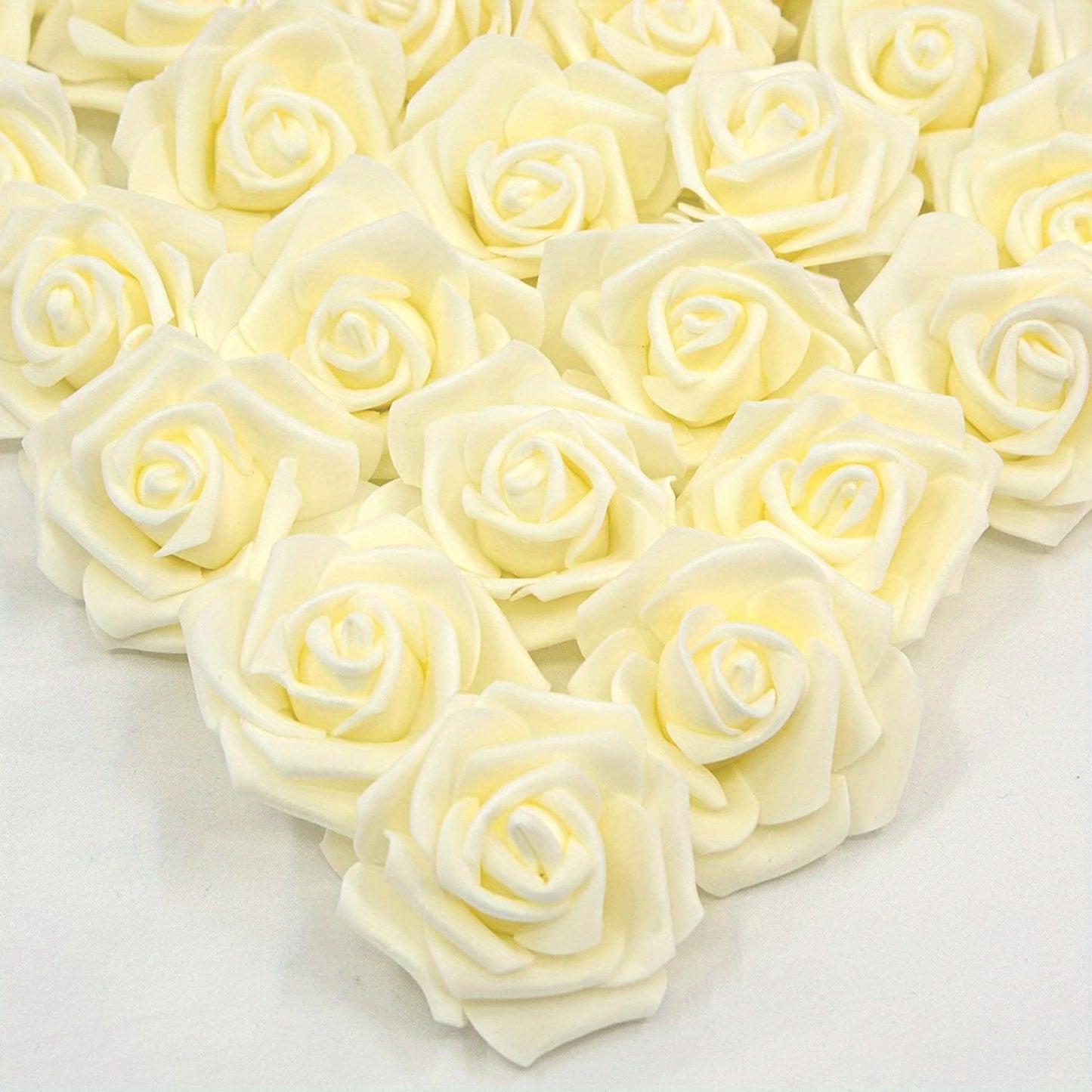 50pcs of 7.5cm Artificial Foam Rose Flower Heads in Ivory White for Wedding Party Home DIY decorations.