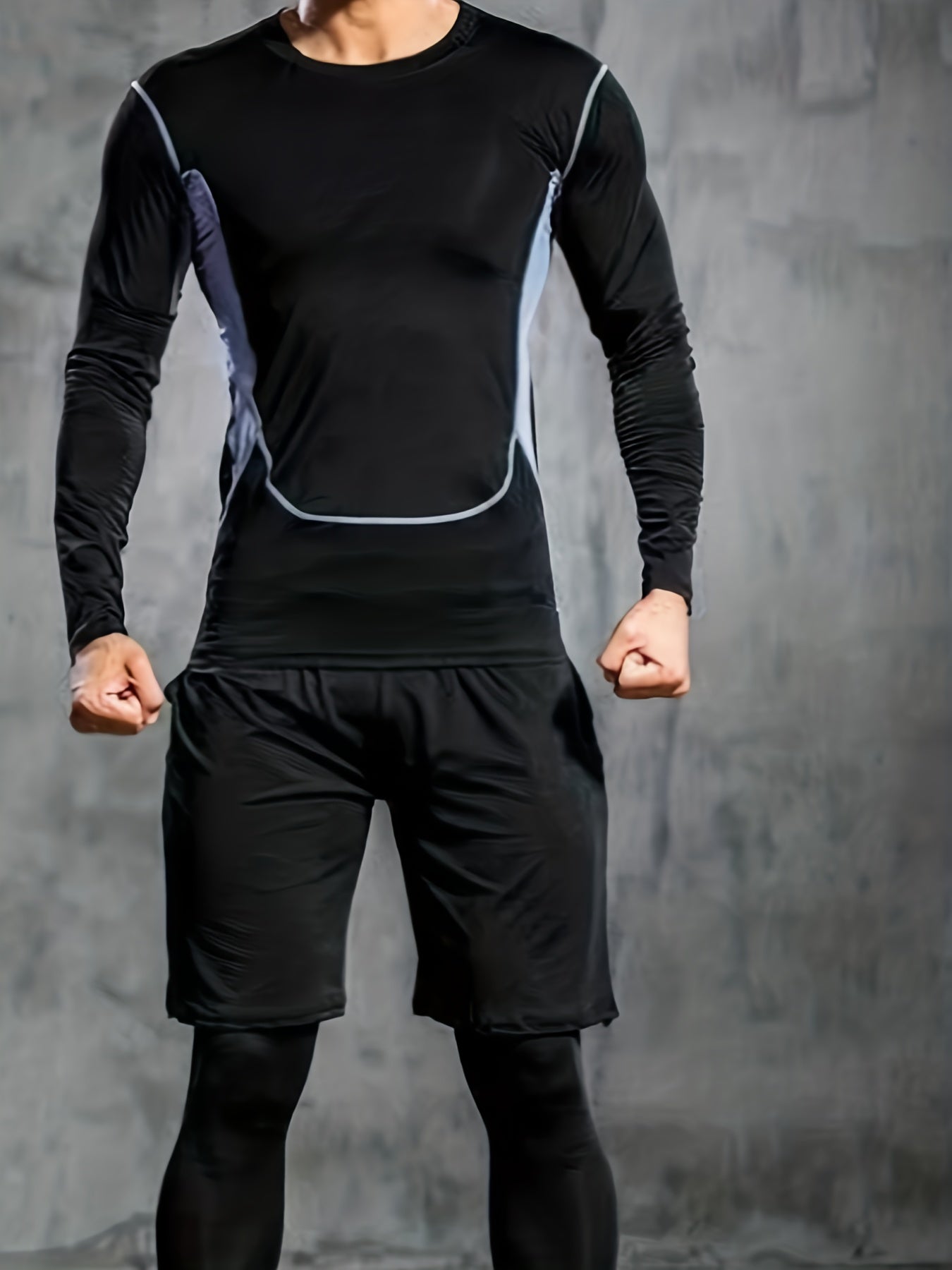 Men's tight sportswear set for gym workouts and running, featuring breathable long sleeve shirts and indoor workout pants.