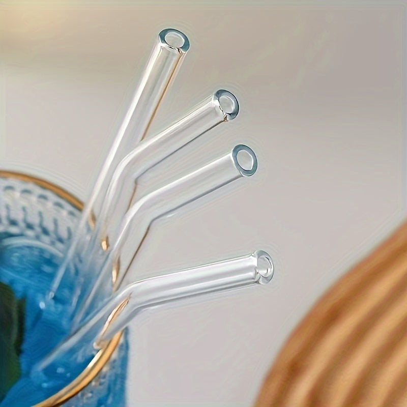 A package containing 6 high borosilicate transparent glass straws and 1 cleaning brush. These heat-resistant, washable, and reusable straws are perfect for enjoying your favorite drinks.