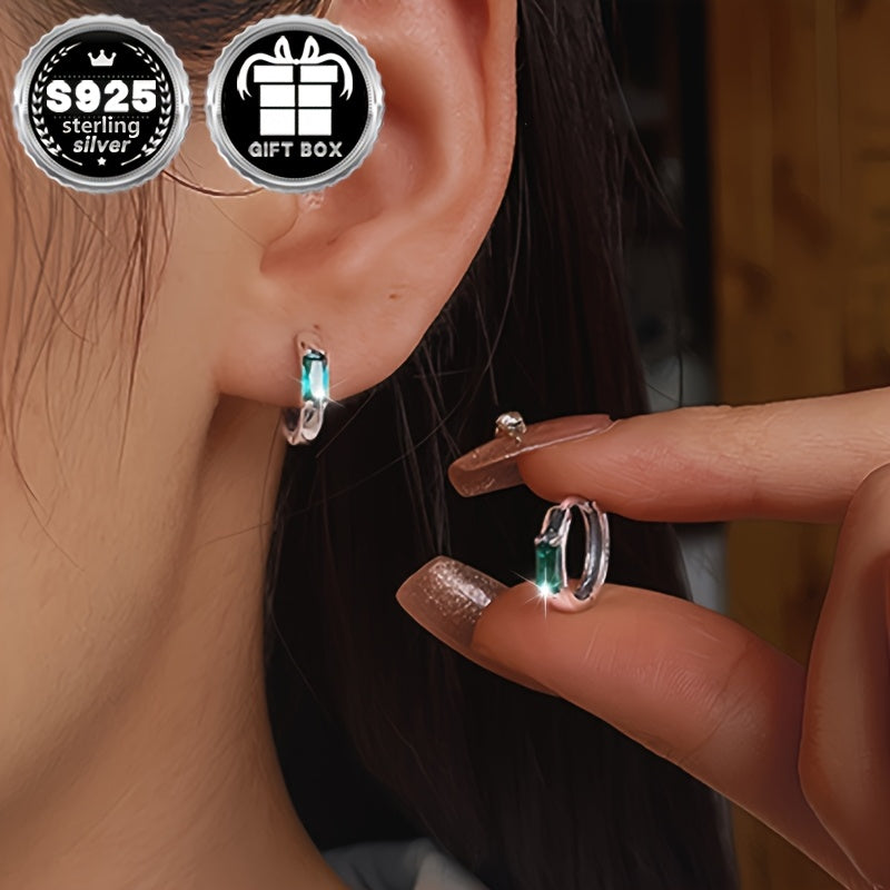 Stylish and versatile unisex earrings made of 2 pieces of sterling silver with low sensitivity. Featuring simple inlaid small square green zirconia for an elegant touch. Approximately weighing 1.9g.