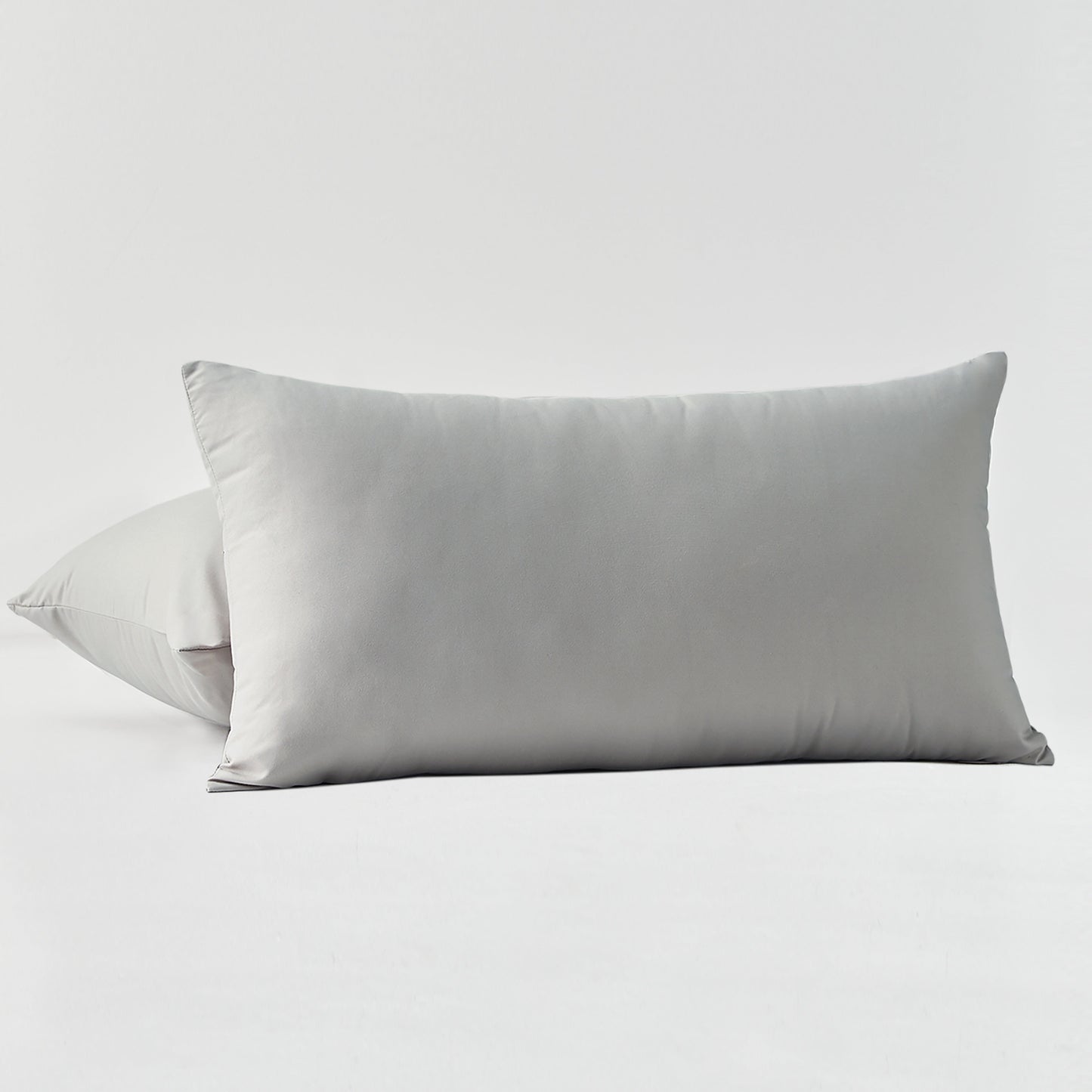 Two pillowcases made of ultra-fine microfiber solid color brushed fabric, fashioned from 100% polyester, perfect for the bedroom. Set includes 2 pillowcases.