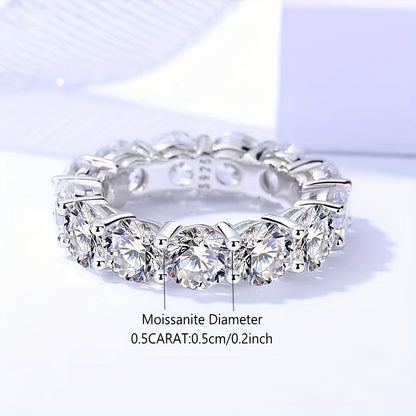 This sophisticated 925 sterling silver Moissanite ring features a stunning 7-carat full diamond row design inspired by Y2K style. It is ideal for daily wear, vacations, dates, parties, weddings, engagements, and proposals. This exquisite piece makes the