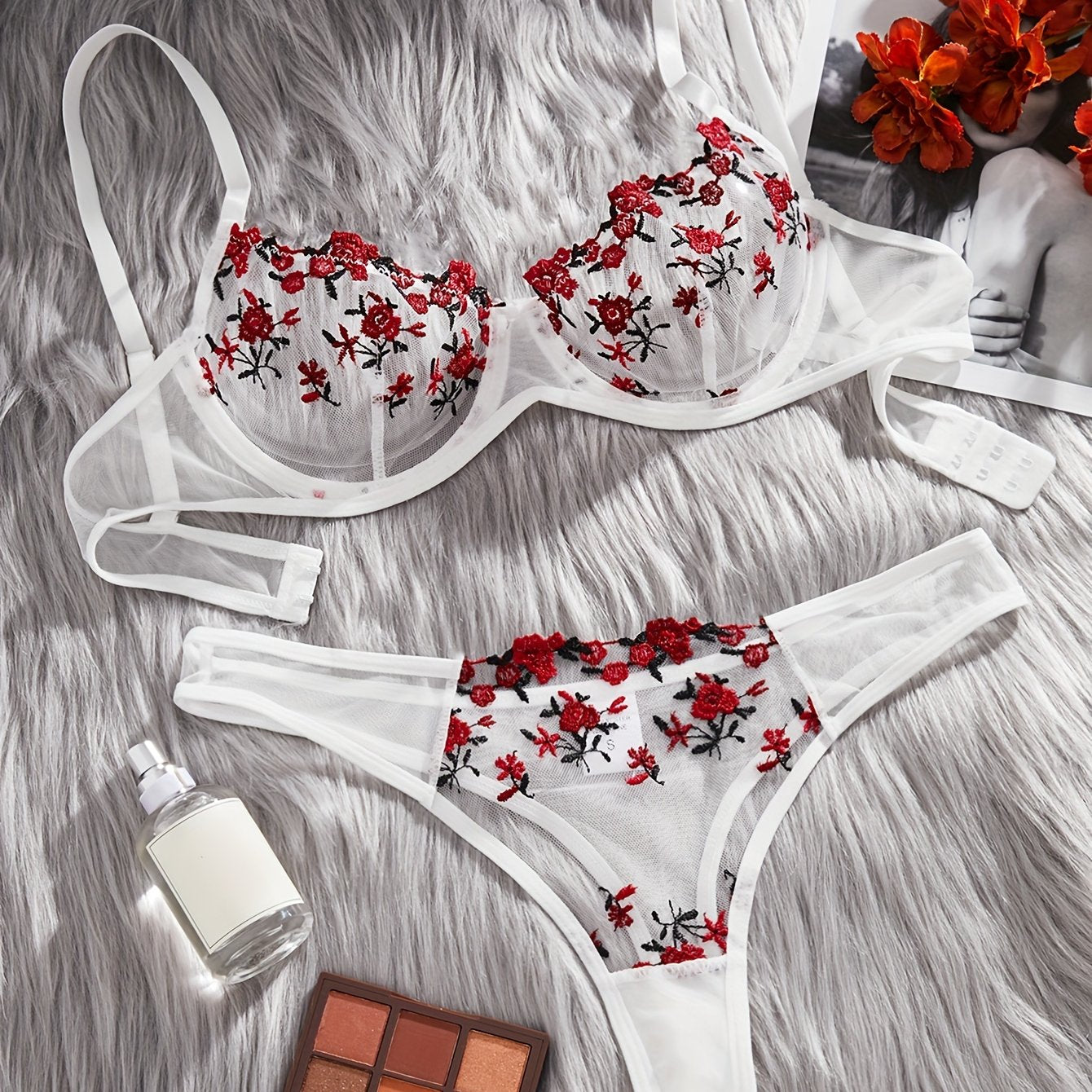 Stylish floral embroidered lingerie set for women made from polyester knit fabric. Features a breathable mesh bra and drop waist briefs with medium support. Comes in ditsy pattern and