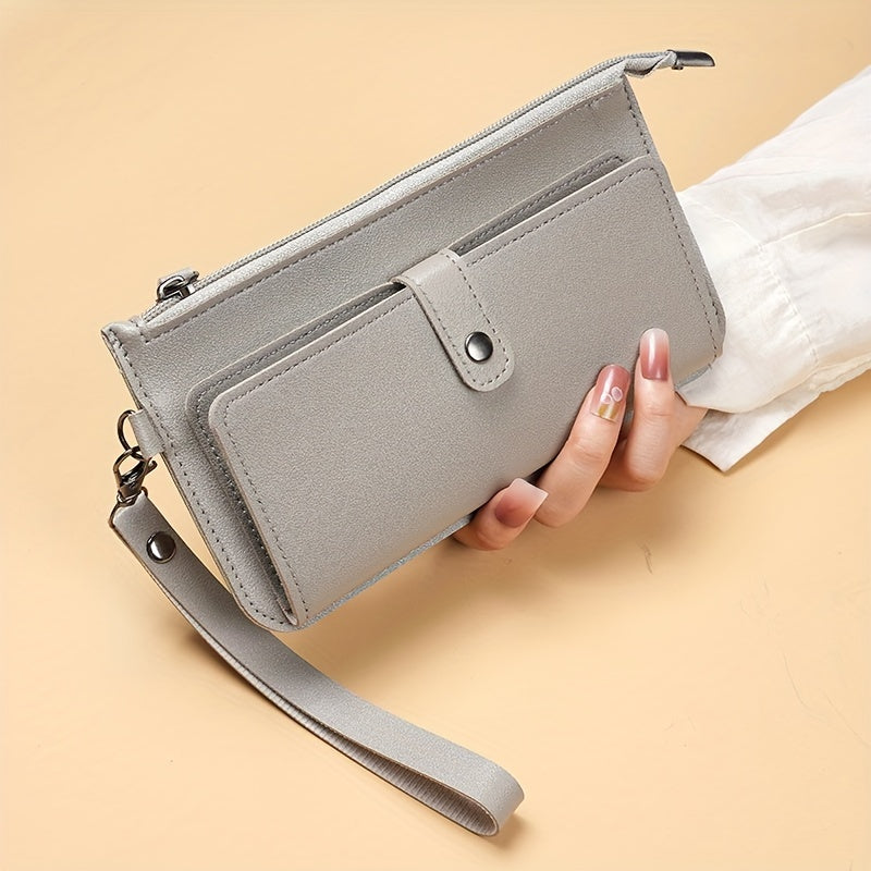 Casual women's wallet with large capacity, zippered coin purse, card slots, and wristlet clutch in faux leather.