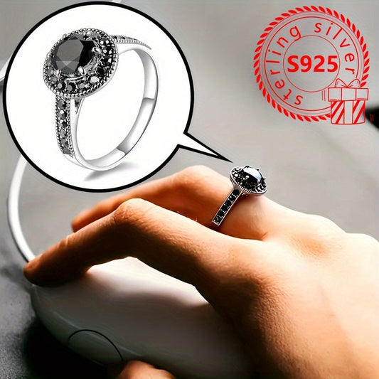 This stunning 925 sterling silver ring features a vintage-inspired design with a black cubic zirconia stone. Perfect for both casual wear and gifting, this ring comes with a gift box and weighs 2.9g. Ideal for ladies who appreciate timeless elegance.