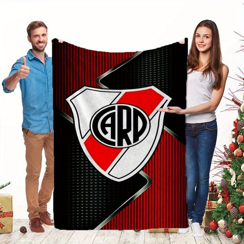 Stay cozy with a River Plate inspired printed fleece blanket. This soft and warm blanket is perfect for sofas, beds, and camping trips. It is machine washable and suitable for all seasons, making it a versatile gift for home and travel.