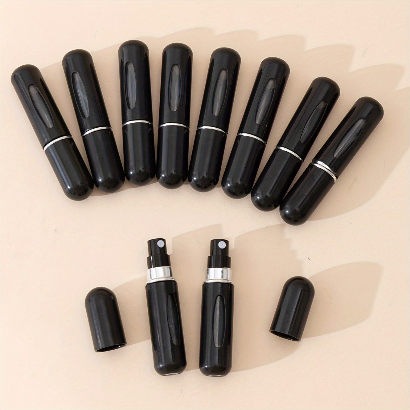 10 count of 5ml portable fine mist spray bottles for perfume, oil, cologne, and liquid. Easy-pump design for convenient travel refill.