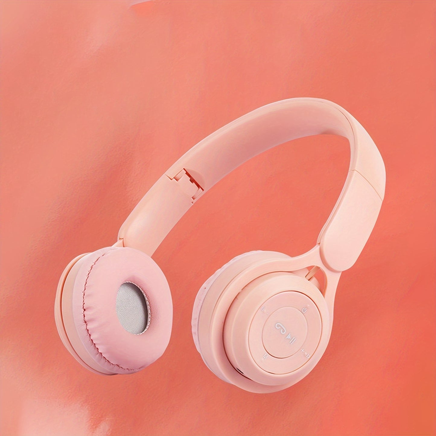 Wireless over-ear headset with 20 hours of playtime, foldable and comfortable for travel, home, office, suitable for kids, teens, adults, girls, and women.