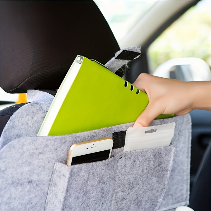 Multi-functional car seat back hanging storage bag for car interior.