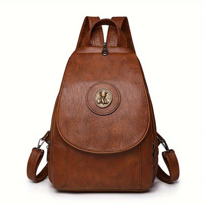 Women's retro-style synthetic leather backpack with adjustable straps, multiple compartments, magnetic closure, and denim design in brown, beige, or black for daily or work use.