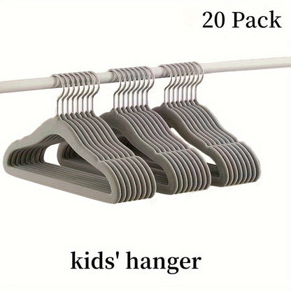 The HOUCOC 20-piece Velvet Hangers Set is Perfect for Organizing Kids' Clothing in the Closet - Non-Slip and Space-Saving Solution for Pants, Shirts, and Dresses for Children and Teens.