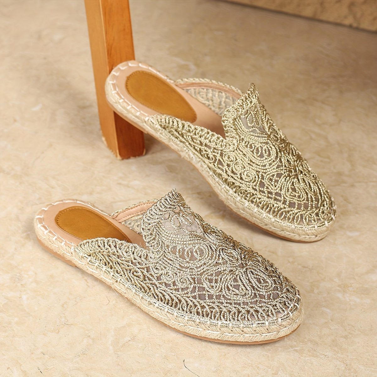 Huizhou's Summer Floral Mules for Women: Lightweight vacation slides with embroidered detailing, round toe, and flat heel, ideal for the beach.