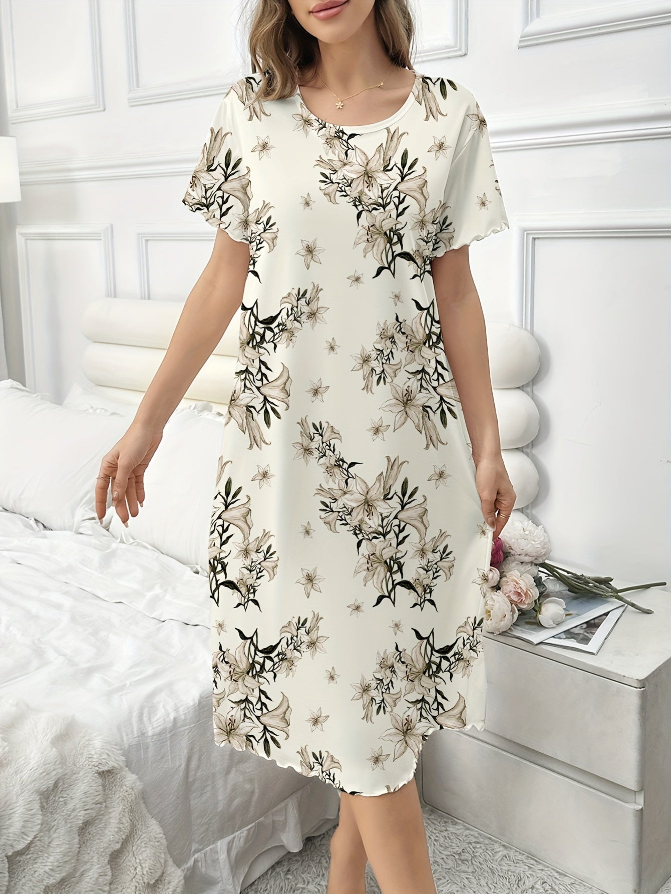 Elegant floral print lounge dress with frill trim, short sleeves, and round neck. Loose fit midi dress for comfortable home wear.