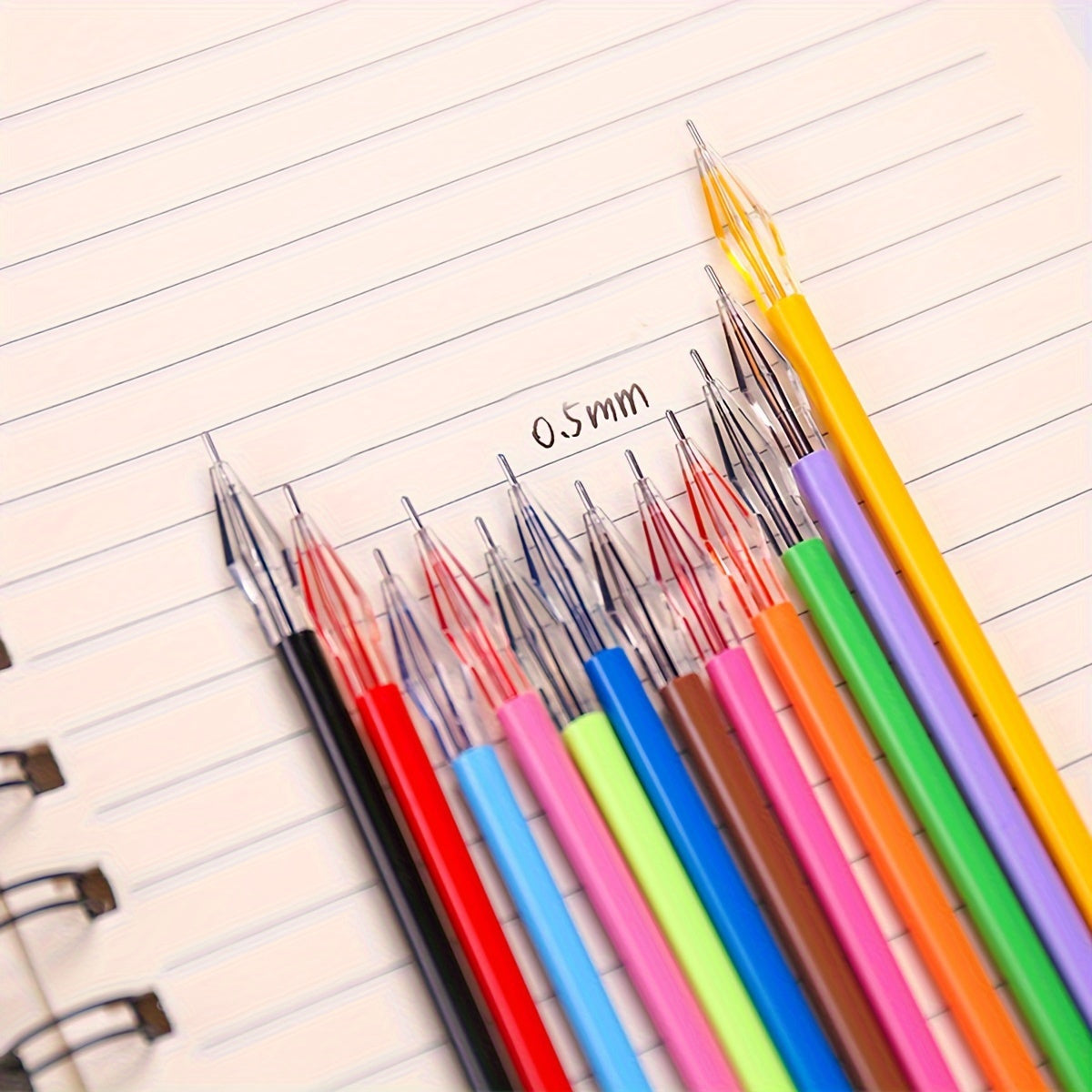 Set of 12 candy-colored 0.5mm refills for note-taking.