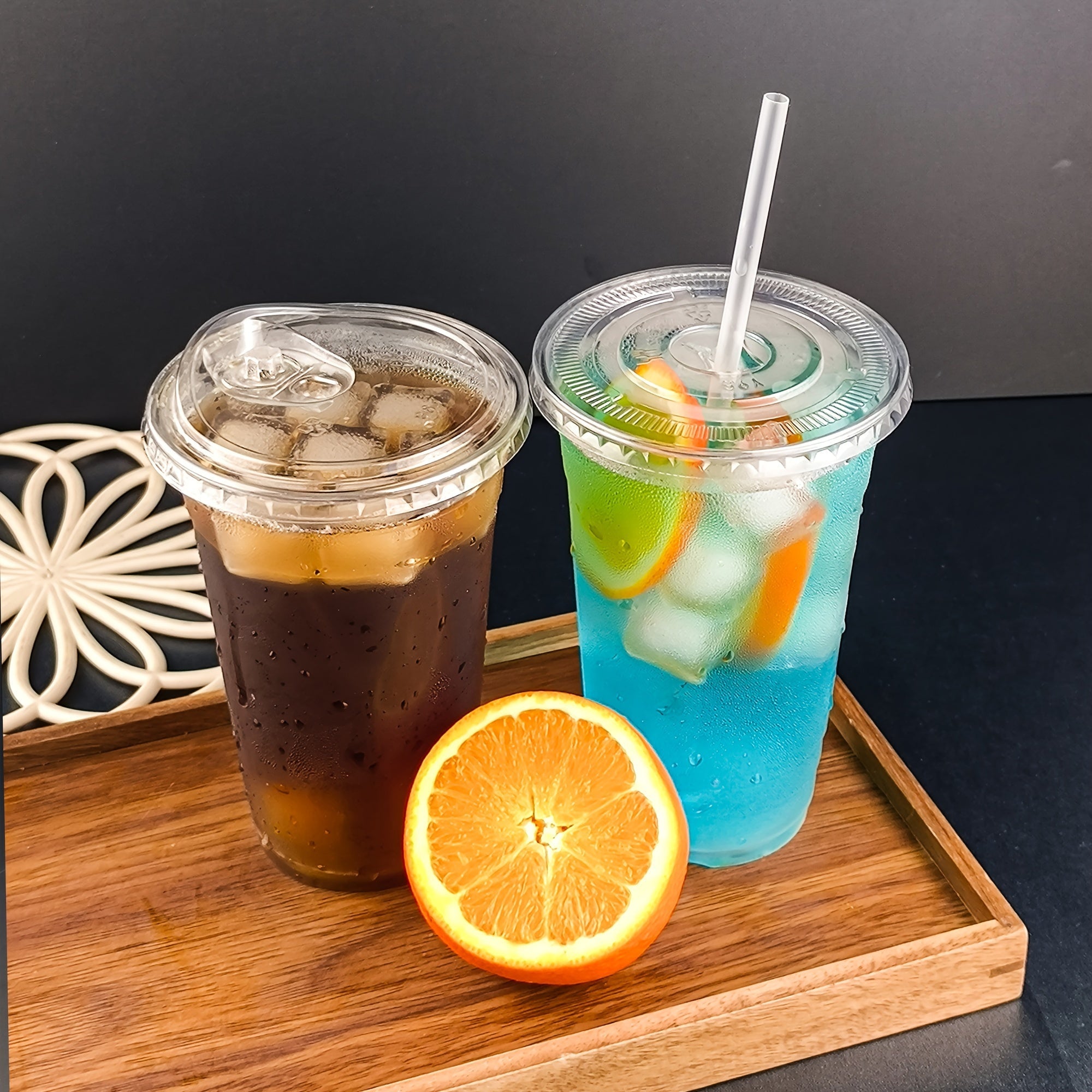 Get 25 sets of 24oz clear plastic cups with lids and straws, made from PET material. These cups are perfect for iced coffee and cold drinks, great for summer, outdoor events, and on-the-go drinkware.