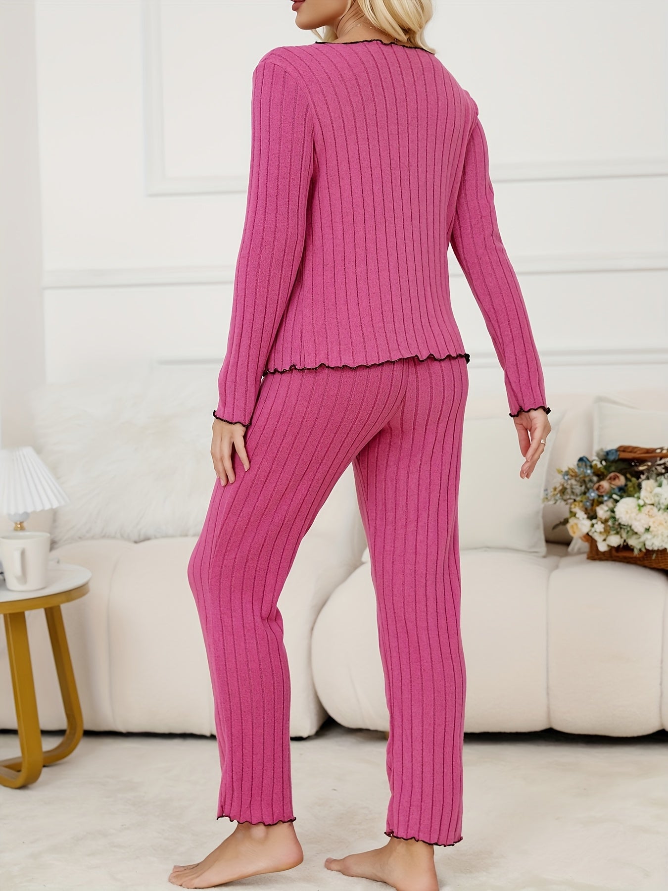 Ribbed lounge set with frill trim, long sleeve top, and pants, perfect for women's loungewear.