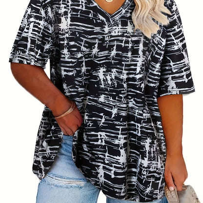 Plus size black & white abstract print t-shirt with v-neck, short sleeves, and drawstring detail. Made of polyester knit, perfect for spring/summer casual wear.