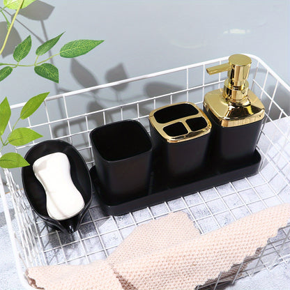 Stylish 5-piece black bathroom set with golden accents, includes lotion dispenser, toothbrush holder, cup, soap dish, and tray made of sleek plastic for elegant home decor.