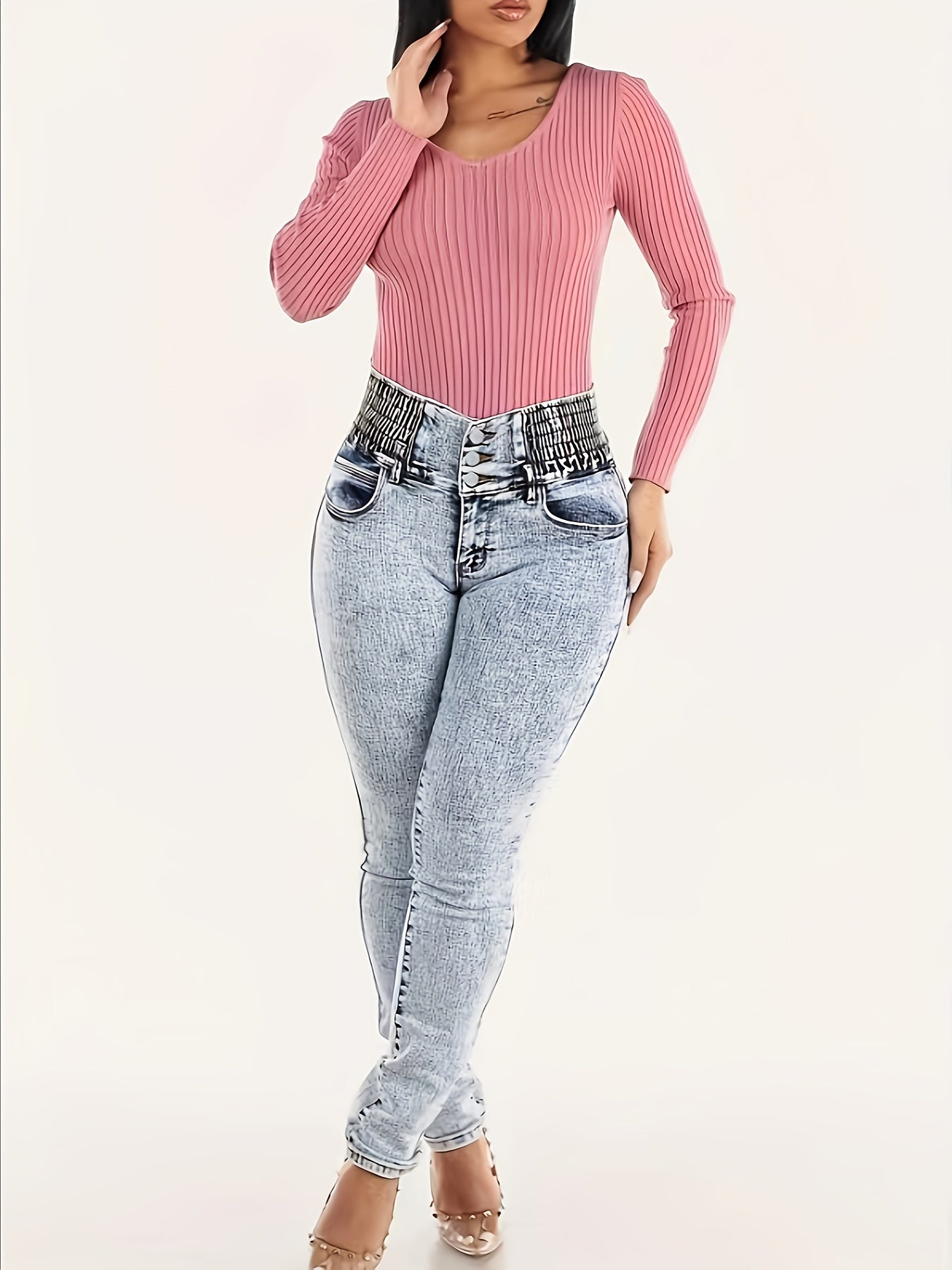 Women's high-waist skinny jeans in light wash denim, with stretch fabric and slash pockets for a comfortable fit year-round.