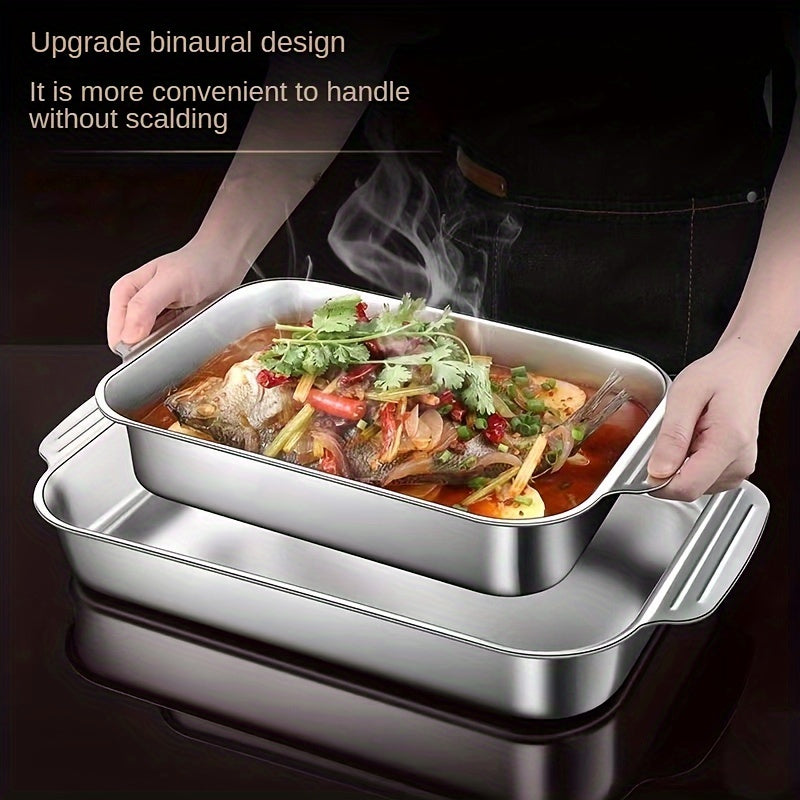 One piece of stainless steel deep baking sheet for non-stick cooking, grilling, and baking in the oven, with a selection of kitchen gadgets and accessories.