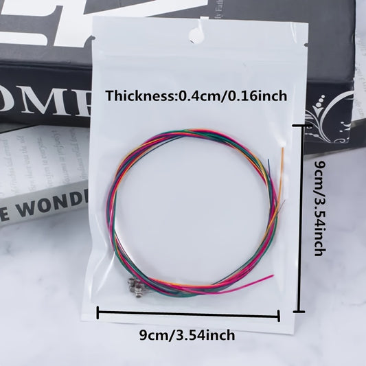 Rainbow guitar strings in a 6-pack with assorted colors, made of durable material, easy to install, suitable for acoustic and classic guitars.