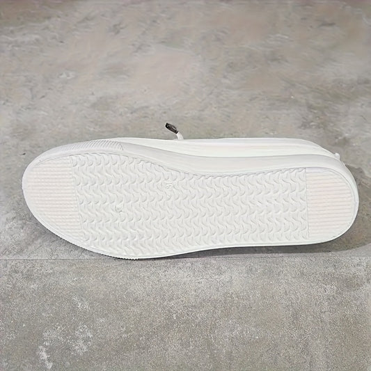 White slip-on sneakers for women, perfect for everyday wear.