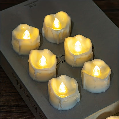 4 battery operated LED tea light candles in warm white for Christmas decoration.