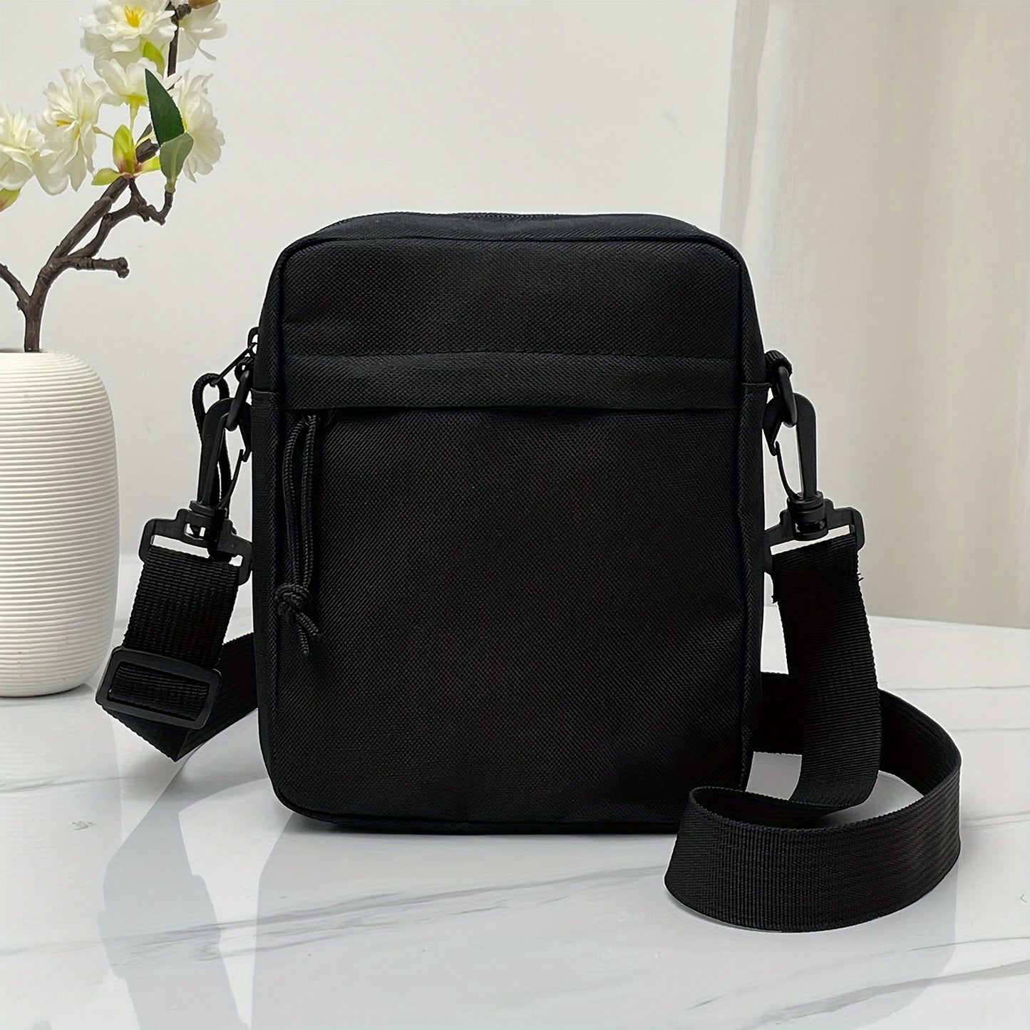 Fashionable and simple men's shoulder bag made of nylon, suitable for casual wear.