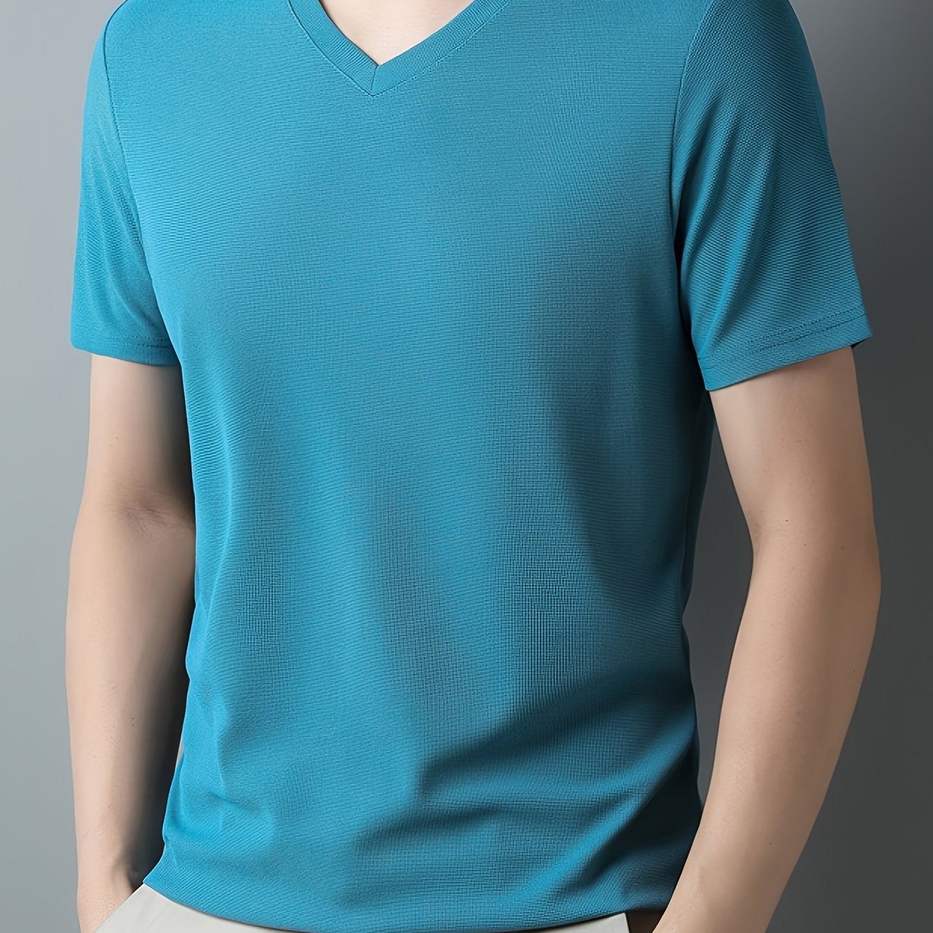 Men's casual short sleeve V-neck tee for summer outdoor wear.