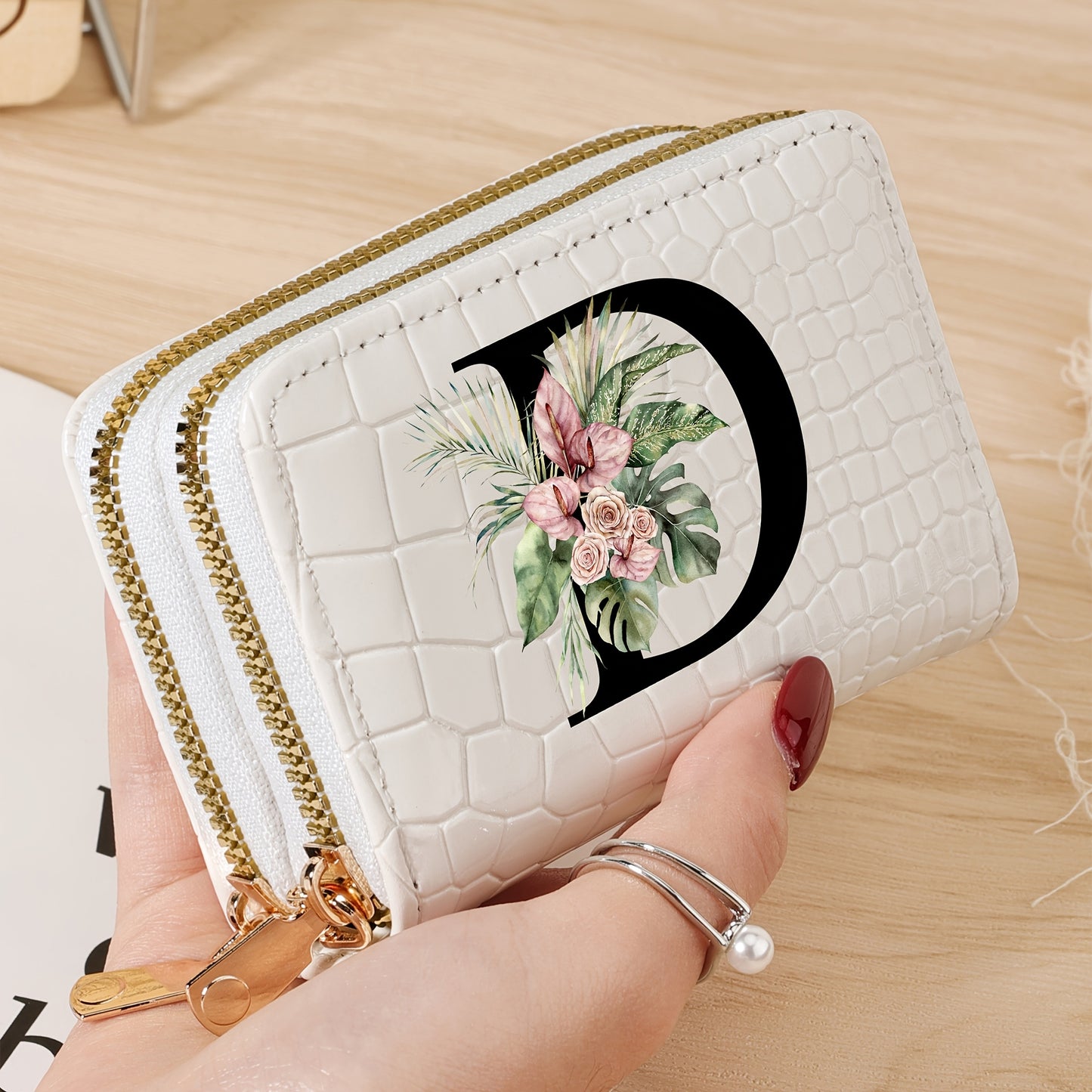 Women's credit card wallet with elegant floral letter print in black & white. Features large capacity, dual zipper, crocodile texture PU, lightweight design with nylon lining for everyday