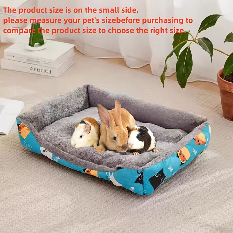 Rectangle pet bed with blue cartoon design, soft and comfortable for small to medium breeds. Made with polyester fiber fill.