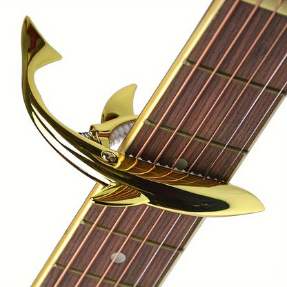 Stylish zinc alloy capo for acoustic and electric guitars, changes pitch.