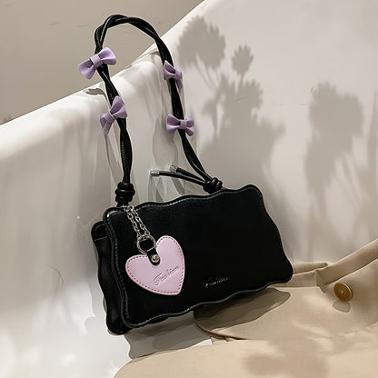 Baguette shoulder bag made of PU material with butterfly bow accents. Versatile and chic fashion accessory.