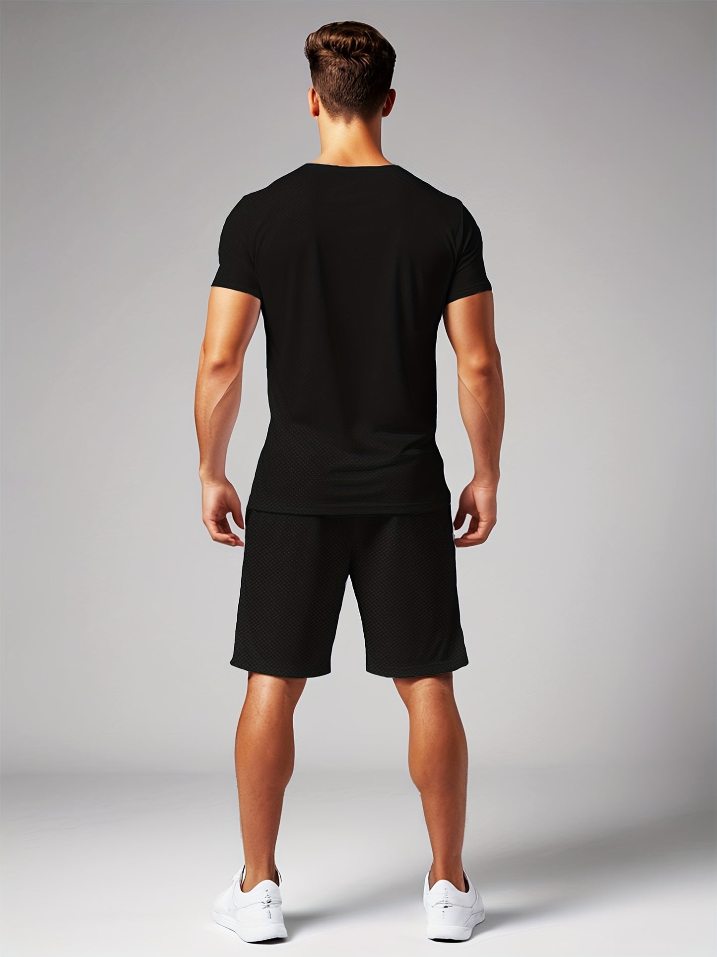 Men's casual short sleeve t-shirt and shorts set with all-over print. Made of polyester with slight stretch, this crew neck pullover is perfect for summer outdoor activities.