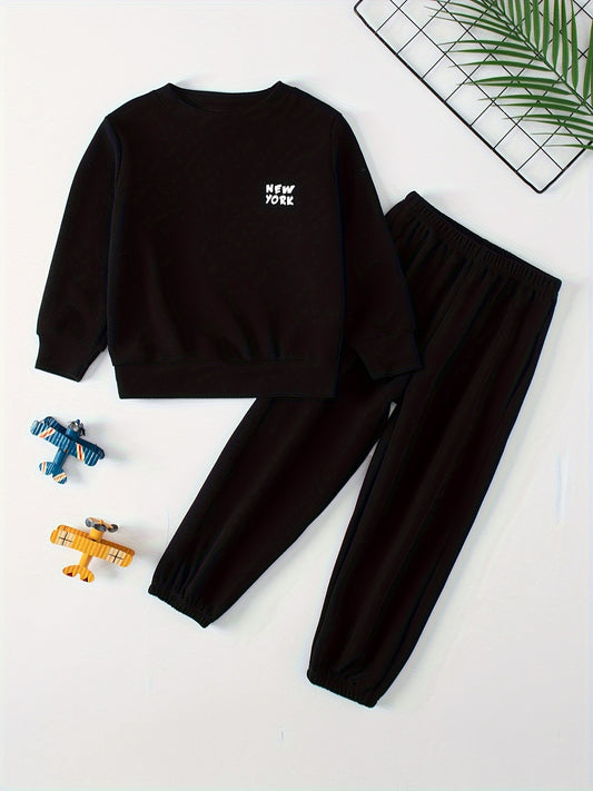 Children's casual sweatshirt and pants set made of polyester and spandex blend. Solid color with round neck, long sleeves, and knit fabric. Regular fit with pocket detail, suitable for