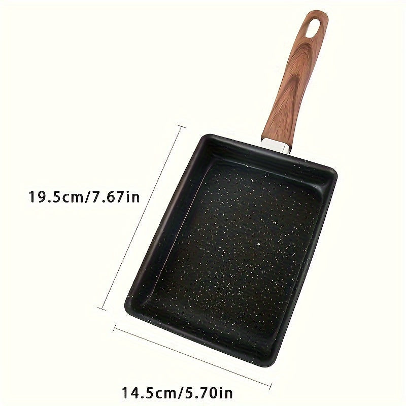 Non-stick Tamagoyaki Japanese omelette pan with imitation wood handle, perfect for frying eggs and cooking breakfast. This skillet is durable and hand wash only, making it an essential non-stick kitchenware item.